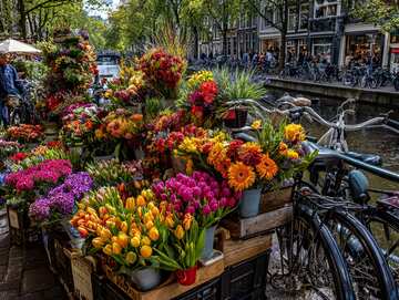 Amsterdam's Vibrant Flower Market beside a canal - picture 3
